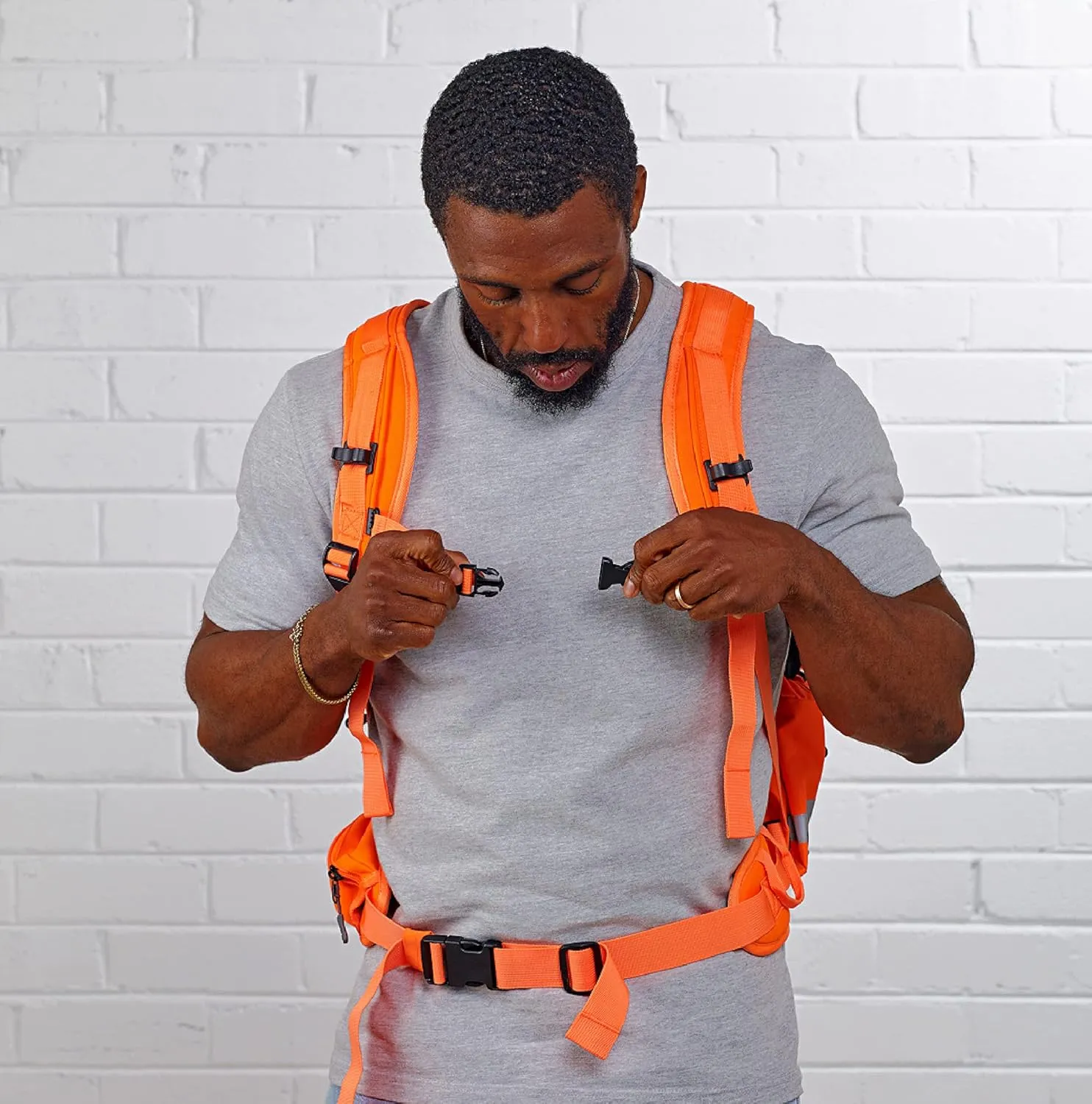 Caribee Mineral King Hi Vis Backpack - Orange Reflective Backpack with Adjustable Hard Hat Holder, Bottle Holders and Hydration Resevoir Compartment
